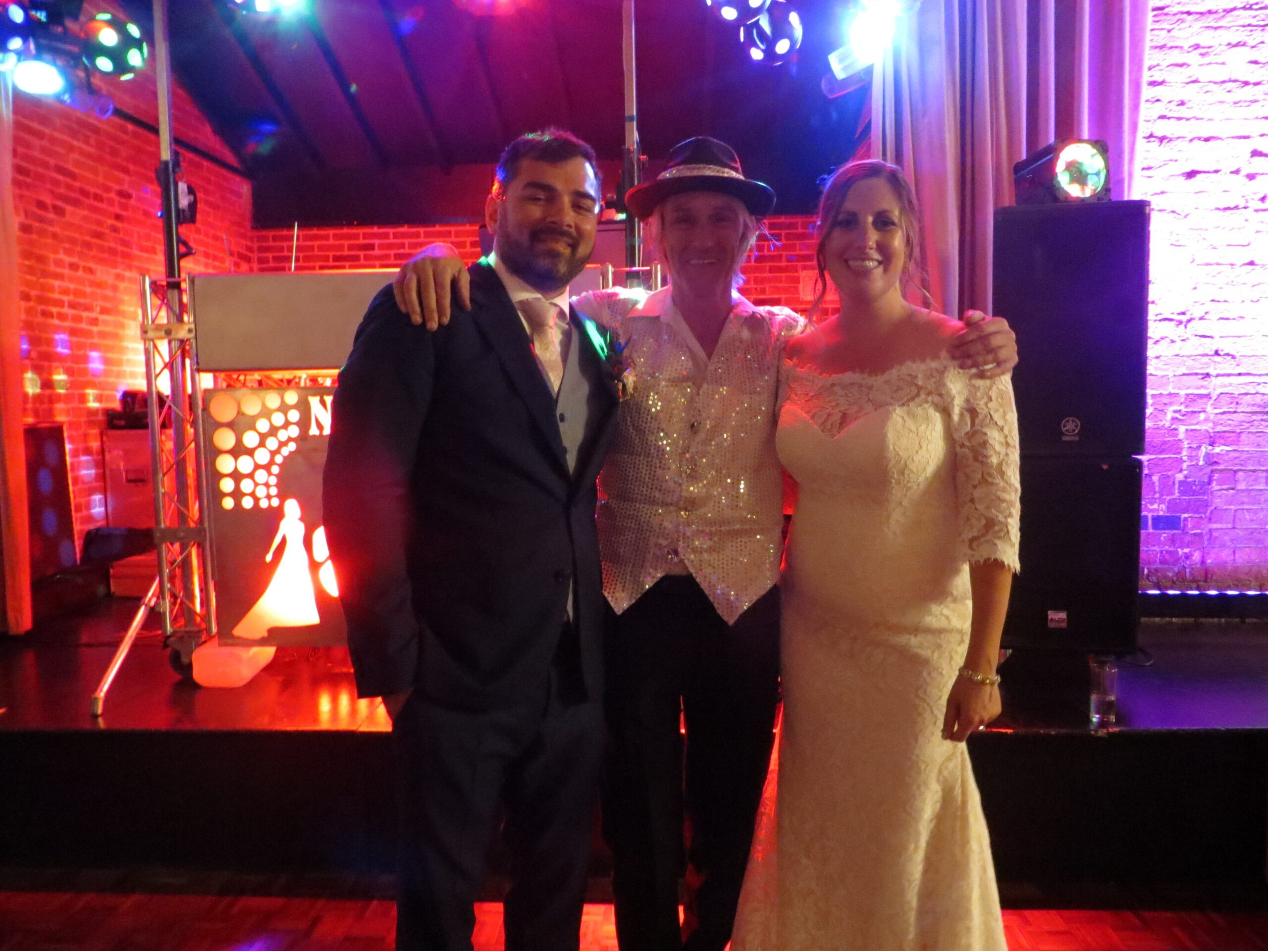 Tim Daymond with a bride and groom on their wedding day in East Anglia